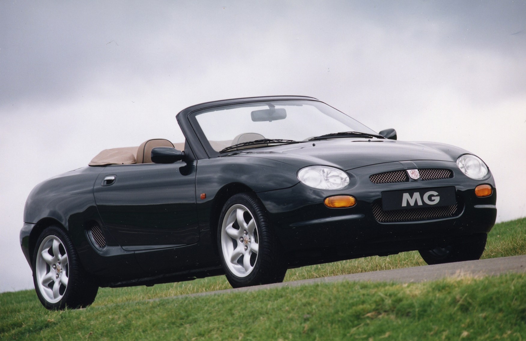 Mgf компакт. MG Roadster 1998. 1995 MG Roadster. MG Rover кабриолет. MG F / MG TF.